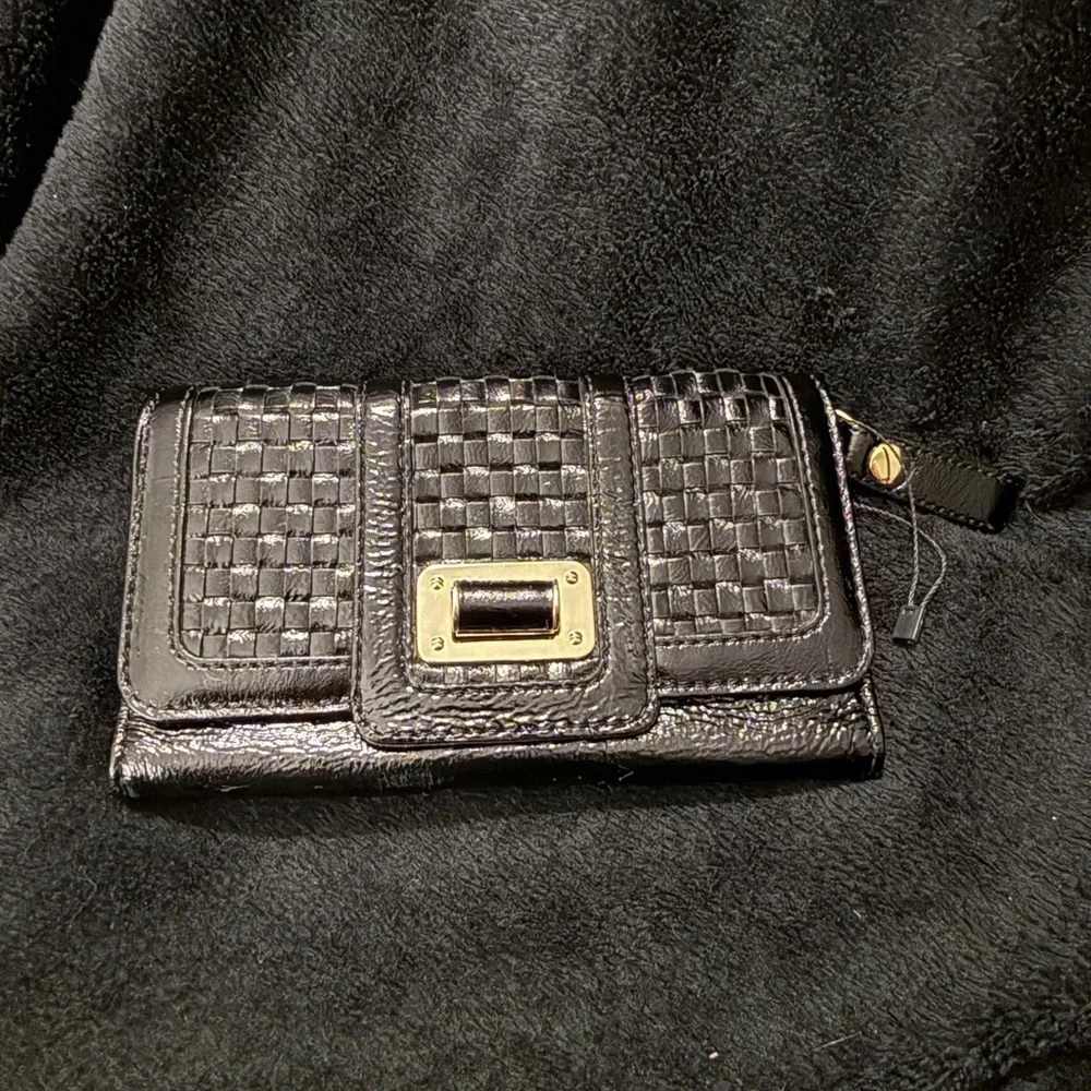 Elliott Lucca Black Cow Leather Clutch with Sliver Detail
